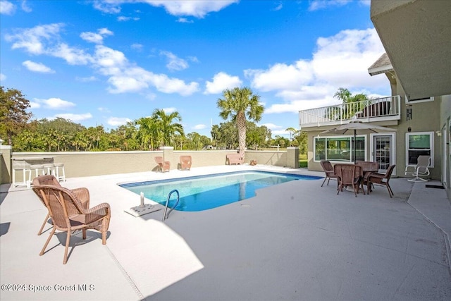 view of pool with a patio area