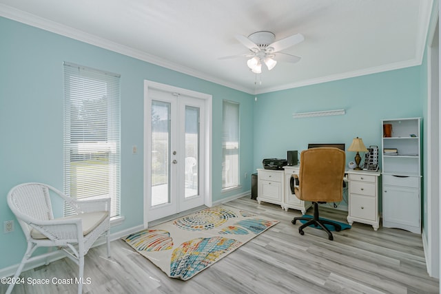 office space featuring french doors, crown molding, light wood-type flooring, and ceiling fan