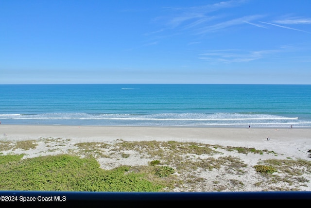 view of water feature with a beach view