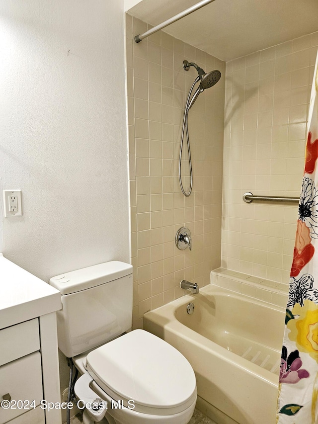 full bathroom featuring vanity, shower / bathtub combination with curtain, and toilet