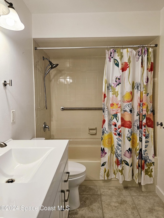 full bathroom featuring tile patterned flooring, vanity, shower / bath combination with curtain, and toilet