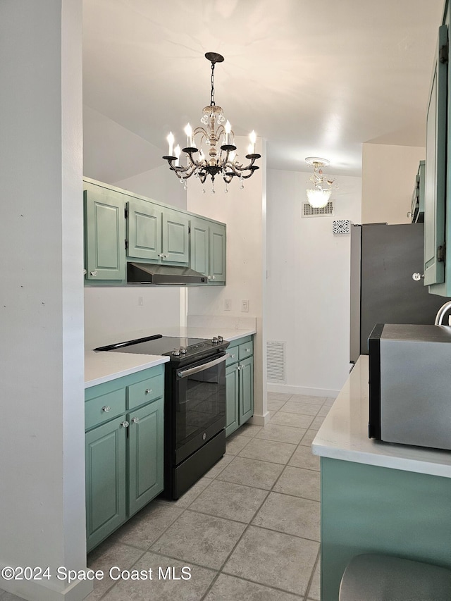 kitchen featuring black range with electric cooktop, green cabinetry, a chandelier, hanging light fixtures, and light tile patterned flooring