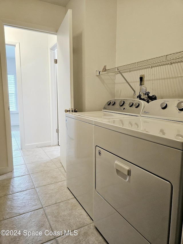 laundry room featuring washing machine and dryer