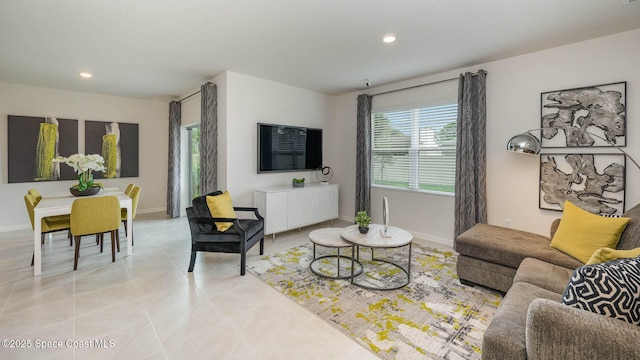 living room featuring light tile patterned flooring