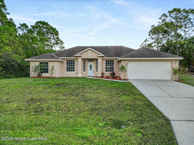 single story home with a front yard and a garage