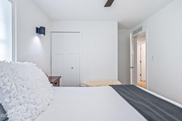 bedroom featuring a closet and ceiling fan