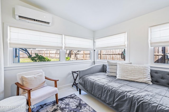 154 21st St SW, Vero Beach, FL 32962 - bedroom with baseboards, vaulted ceiling, and a wall unit AC