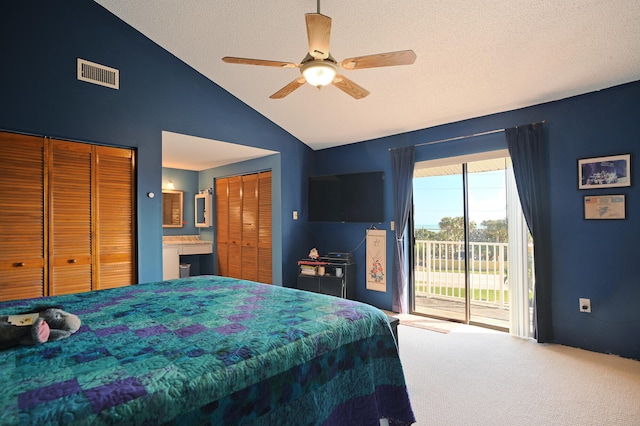 bedroom featuring carpet flooring, access to outside, a textured ceiling, ceiling fan, and vaulted ceiling