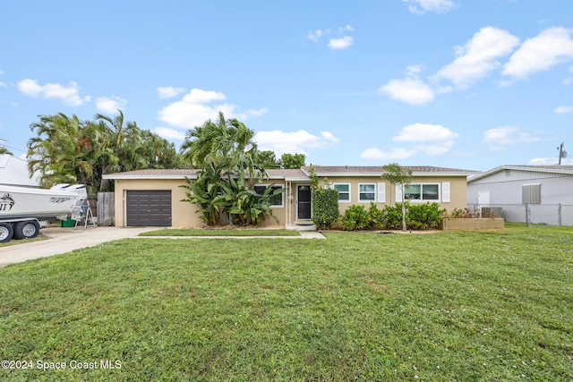 ranch-style house with a front lawn and a garage