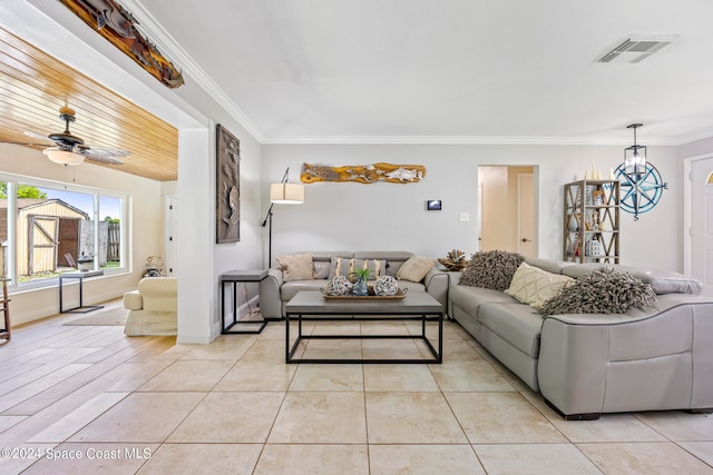 tiled living room with crown molding and ceiling fan with notable chandelier