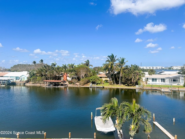 water view featuring a dock