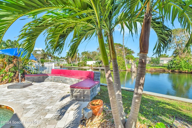 view of patio / terrace featuring a water view