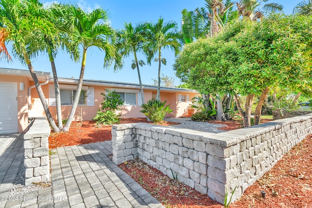 view of front of property featuring a garage