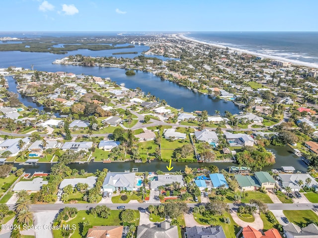 bird's eye view with a water view