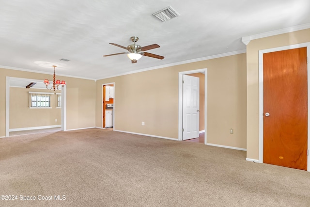 carpeted spare room with ornamental molding and ceiling fan with notable chandelier