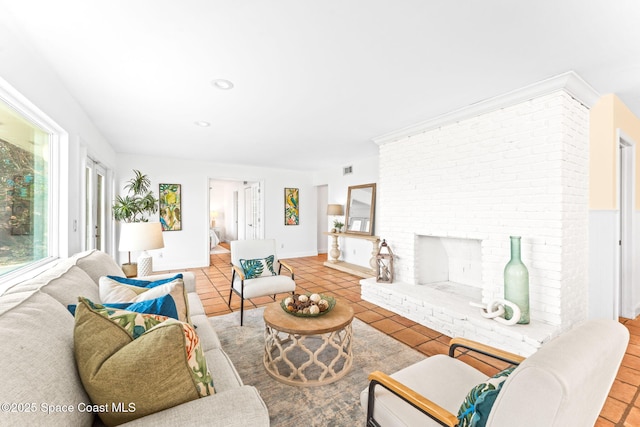 tiled living room with a fireplace