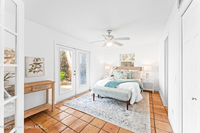 tiled bedroom featuring french doors, ceiling fan, a closet, and access to outside