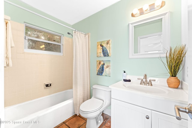 full bathroom with vanity, shower / tub combo with curtain, tile patterned floors, and toilet