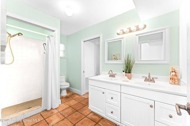 bathroom with vanity, a shower with curtain, and toilet