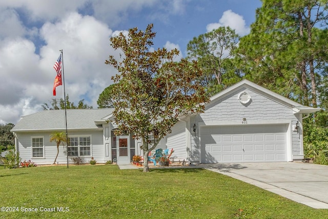 ranch-style home with a front lawn and a garage