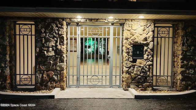 700 Wave Crest Ave Unit 204, Indialantic, FL 32903 - doorway to property featuring a gate