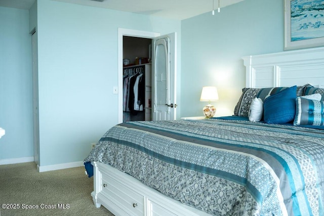 bedroom featuring light colored carpet and a closet