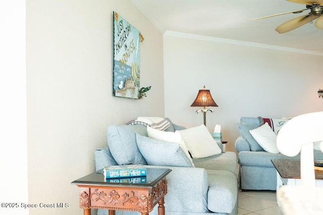 tiled living room with ornamental molding and ceiling fan