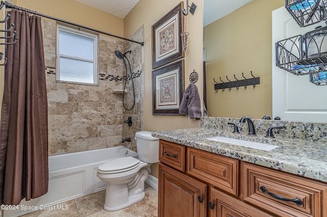 full bathroom featuring a textured ceiling, toilet, shower / bath combo with shower curtain, vanity, and tile patterned floors