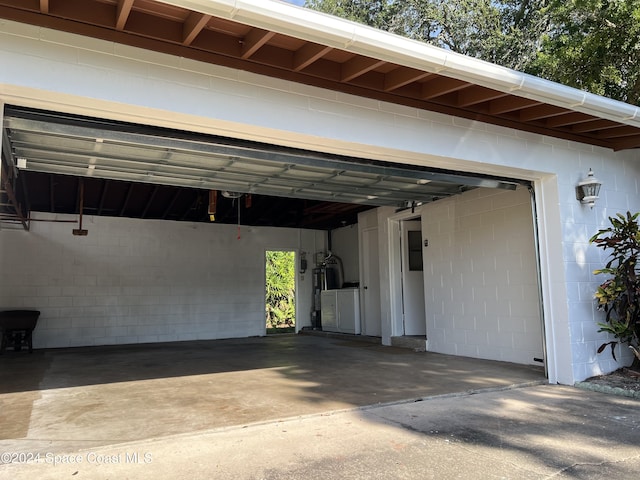 garage featuring a carport