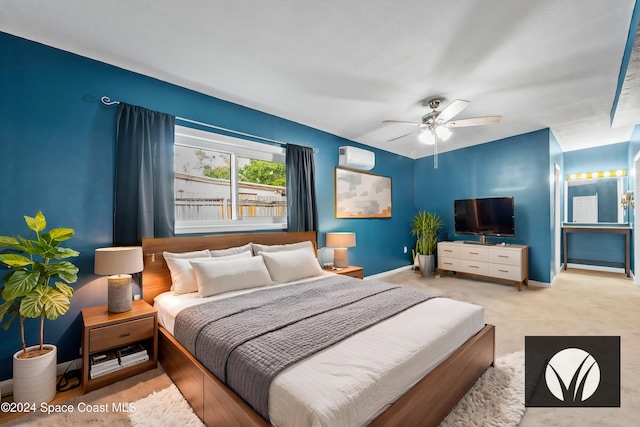 bedroom featuring ceiling fan, light carpet, and a wall mounted AC