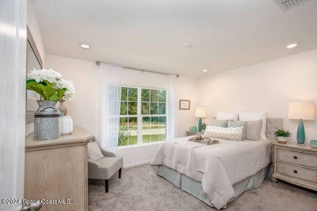 bedroom with visible vents, baseboards, carpet flooring, and recessed lighting