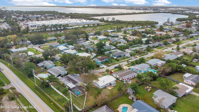 drone / aerial view with a water view