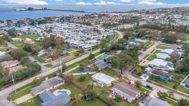 1610 Glen Haven Dr, Merritt Island, FL 32952 - aerial view of property and surrounding area with a nearby body of water, a notable bridge, and nearby suburban area