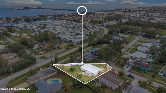 1610 Glen Haven Dr, Merritt Island, FL 32952 - aerial view of residential area with a nearby body of water and property boundaries highlighted