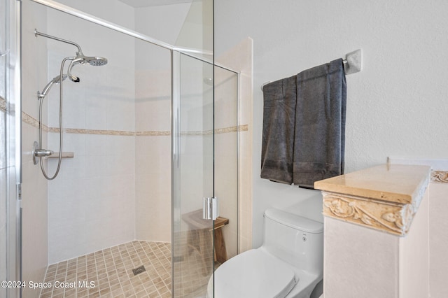 bathroom with toilet and walk in shower