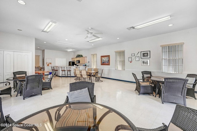 living room with ceiling fan