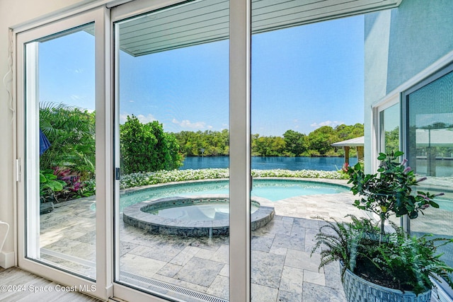 entryway with a water view