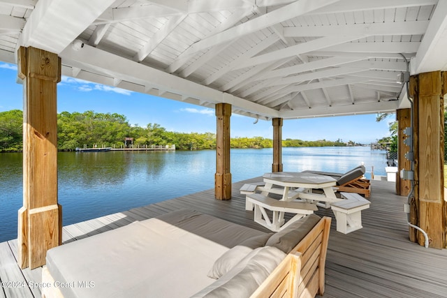 dock area with a gazebo and a water view