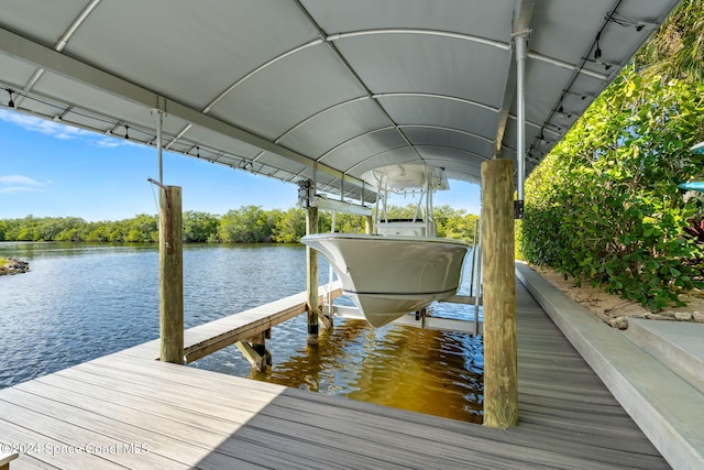 view of dock with a water view