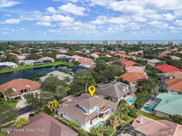 bird's eye view with a water view