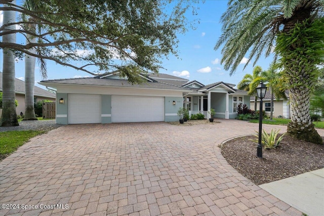 ranch-style home with a garage