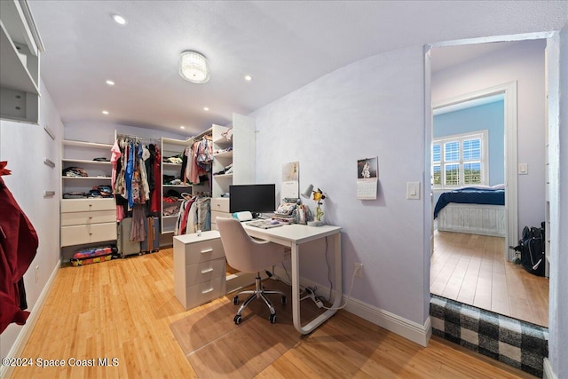 home office with light wood-type flooring