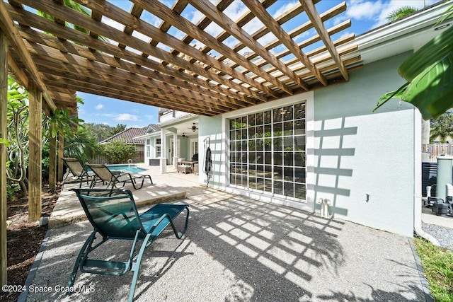 view of patio with a pergola and ceiling fan