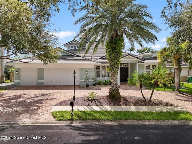 view of front of property with a garage