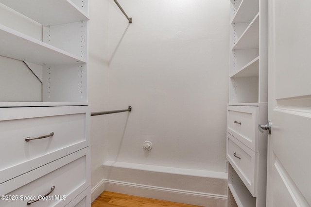 walk in closet featuring light wood-style floors