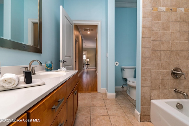 full bath with visible vents, toilet, vanity, baseboards, and tile patterned floors