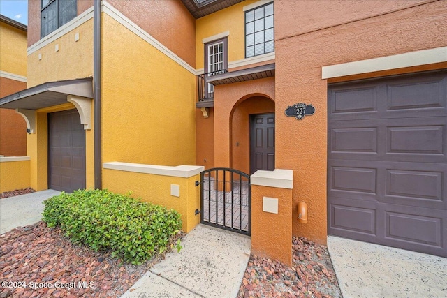 entrance to property with a garage