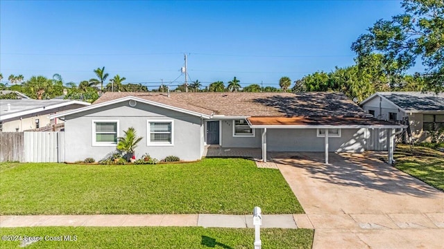 ranch-style home featuring a front yard