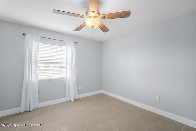 1500 Dorsal St, Merritt Island, FL 32952 - unfurnished room with a ceiling fan and baseboards