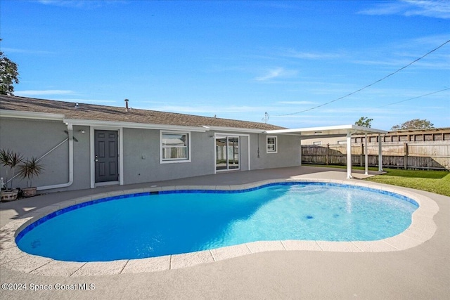 1500 Dorsal St, Merritt Island, FL 32952 - view of swimming pool with a patio area and fence